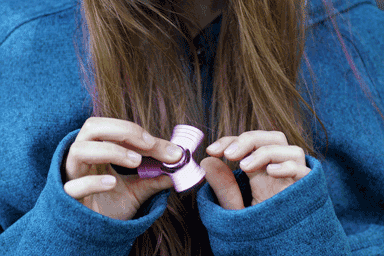 Girl playing with fidget toy